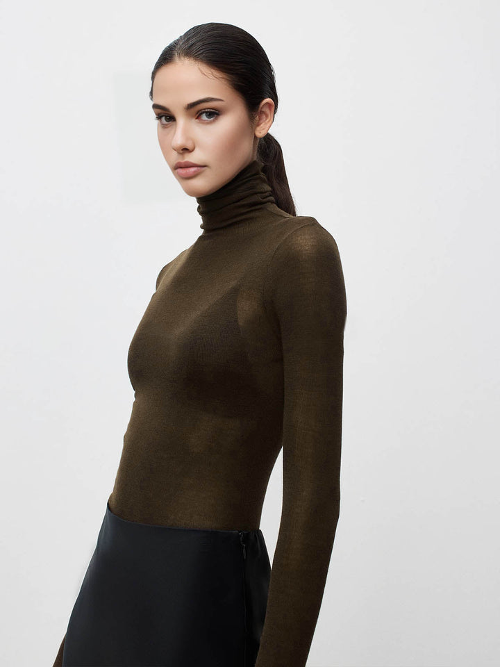 Pull à col roulé en laine mélangée transparente