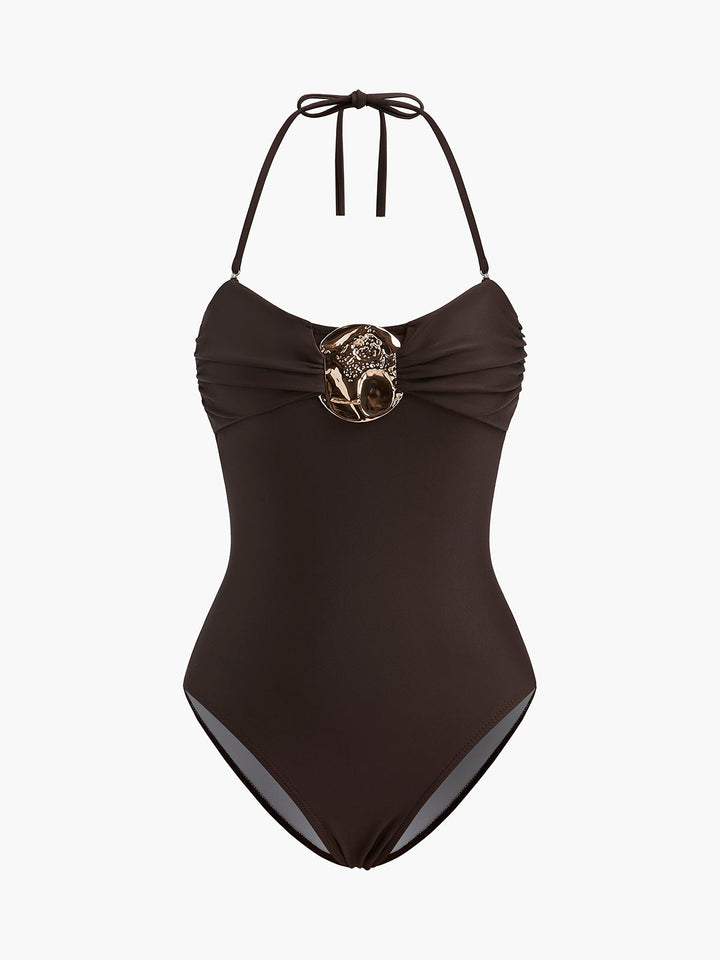 Maillot de bain une pièce à torsades et détails métalliques