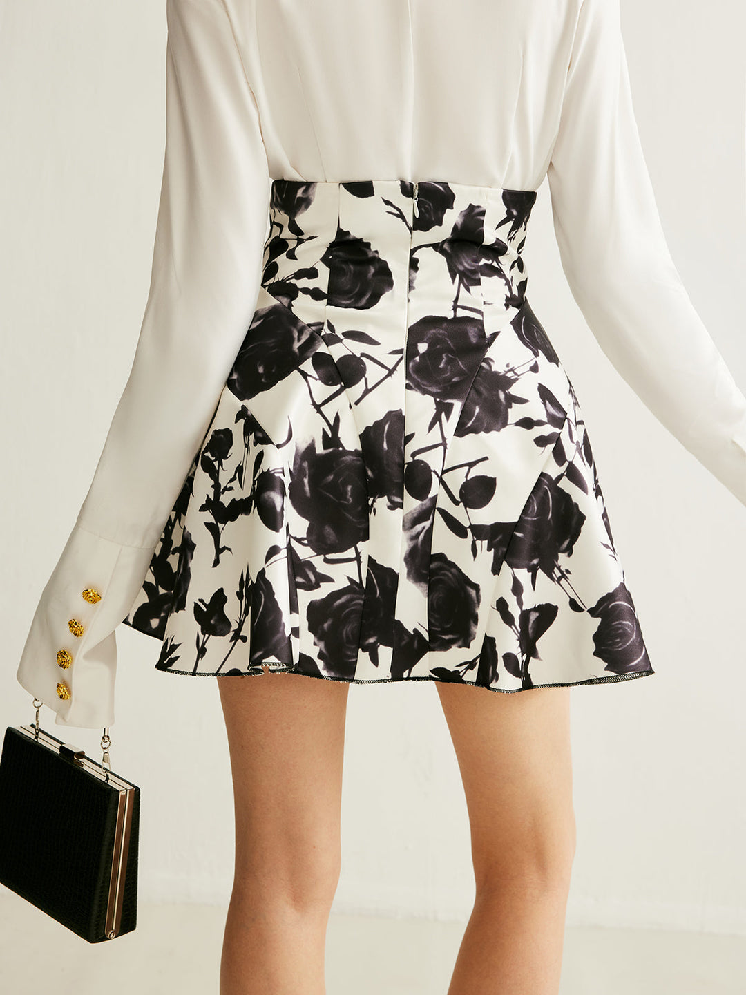 Jupe à imprimé floral avec détails de boutons