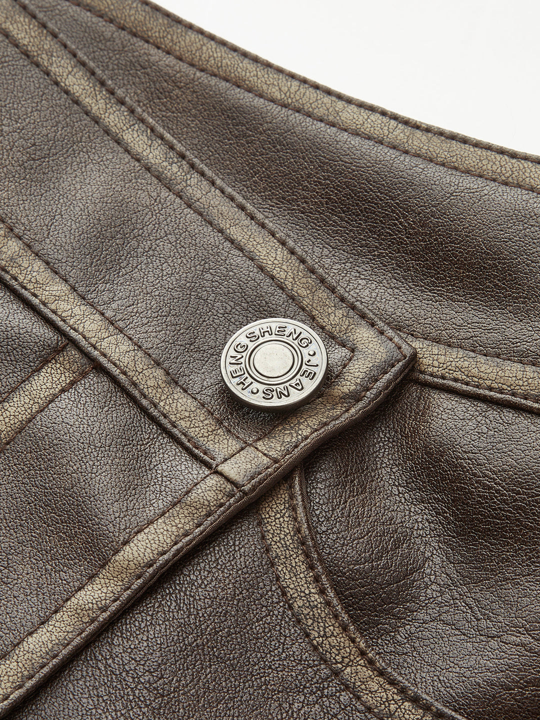 Jupe patte boutonnée en similicuir