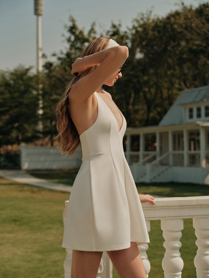 Robe à nœuds plissée à col en V