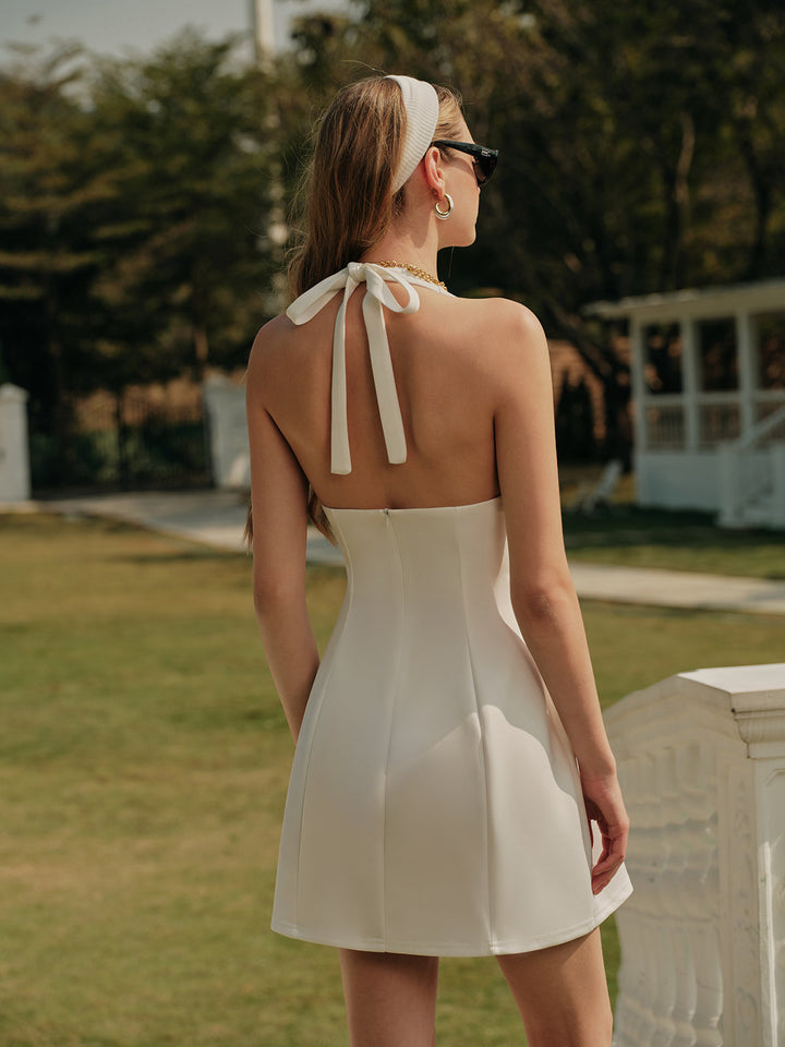 Robe à nœuds plissée à col en V