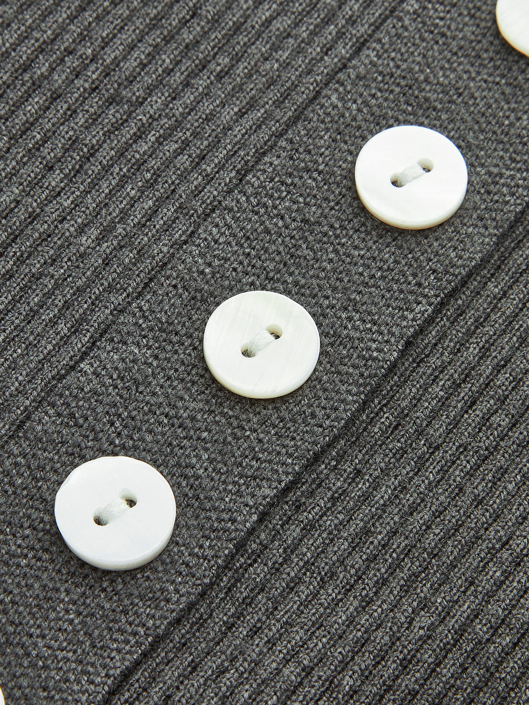 Cardigan en maille à boutons unis