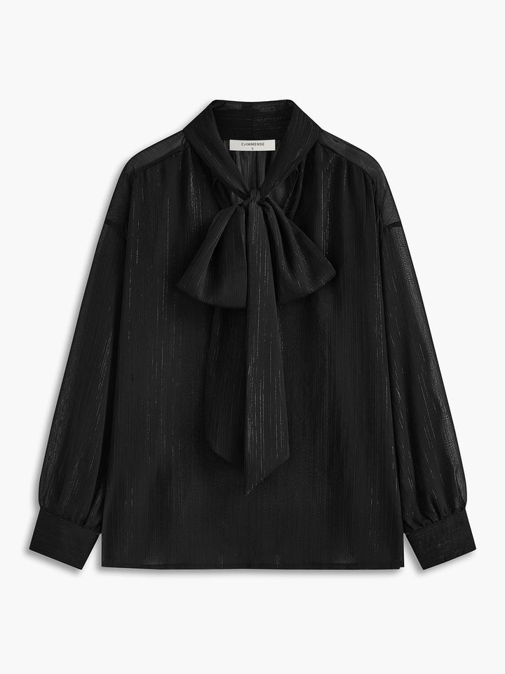 Blouse en mousseline à col noué semi-transparente