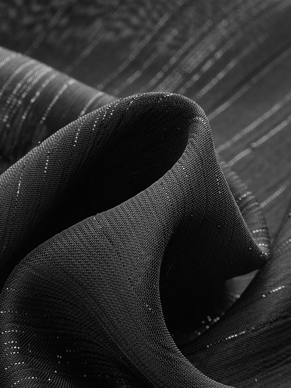 Blouse en mousseline à col noué semi-transparente