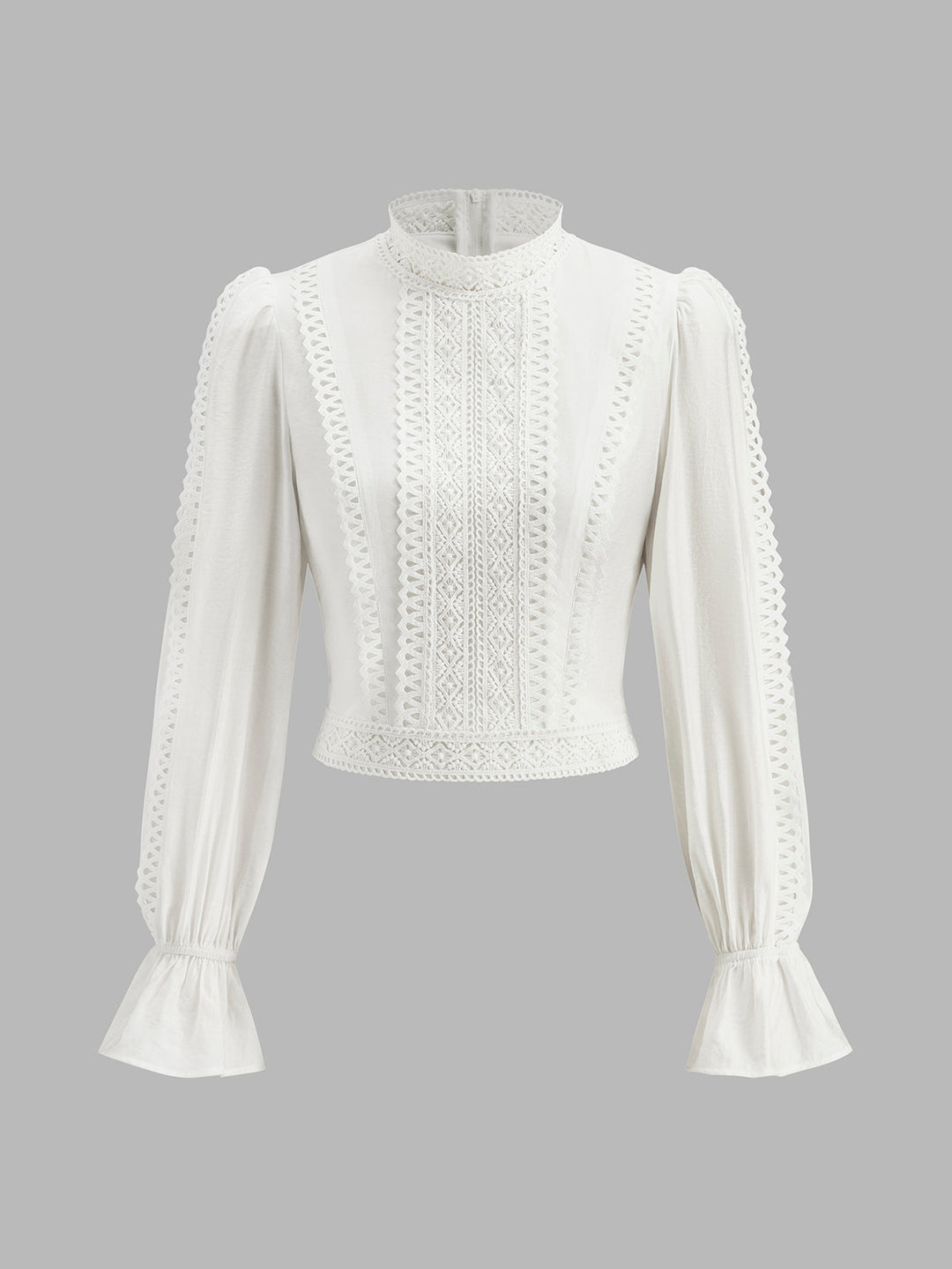 Blouse à col haut et manches bouffantes