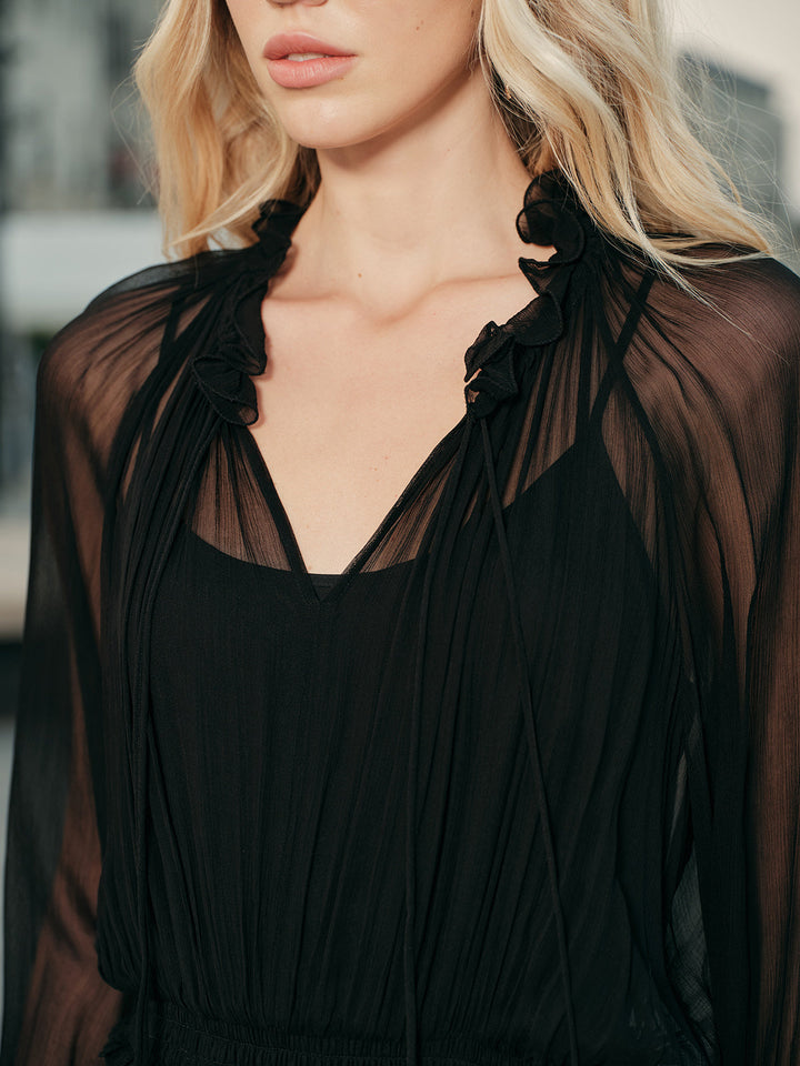 Robe mi-longue semi-transparente en mousseline avec volants