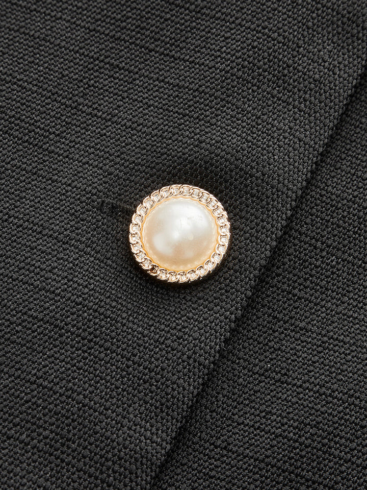 Combinaison sans manches à encolure bain de soleil avec fermeture boutonnée