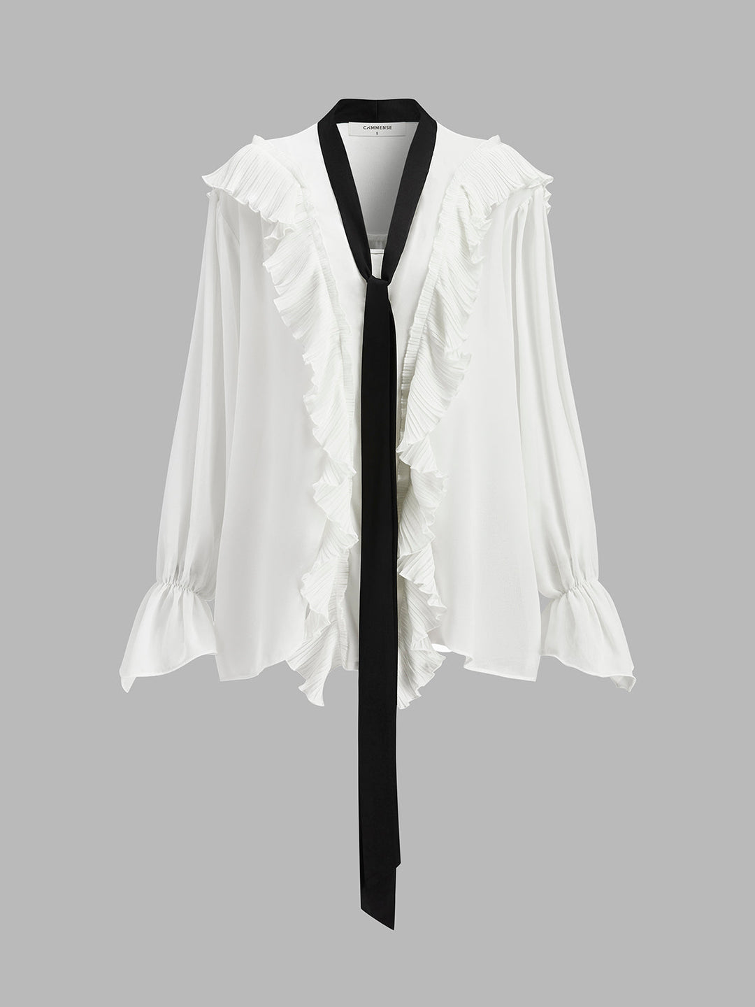 Blouse semi-transparente à volants avec cravate contrastante