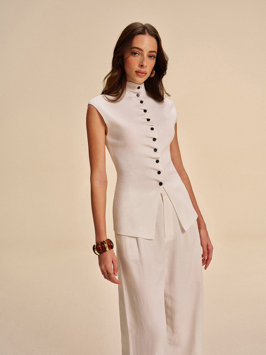 Cardigan sans manches à devant boutonné