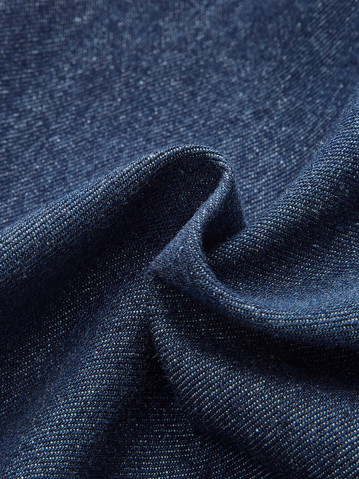 Robe en jean sans manches à col en V et boutonnée