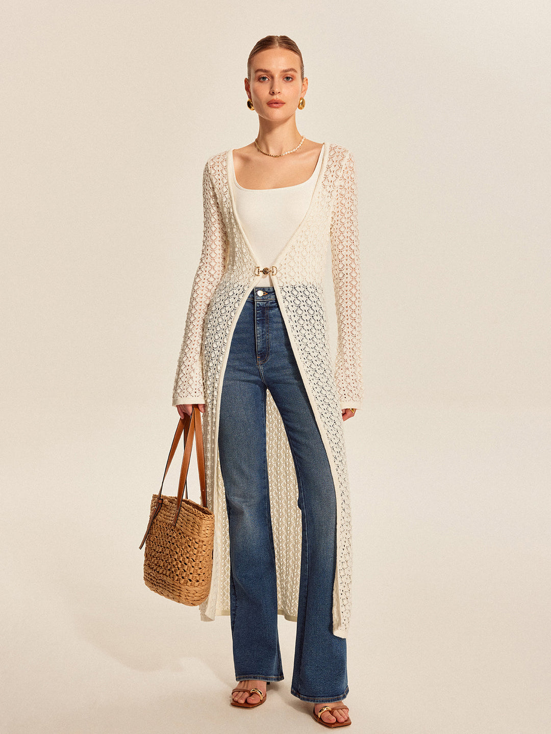 Cardigan en tricot de dentelle avec détails en métal