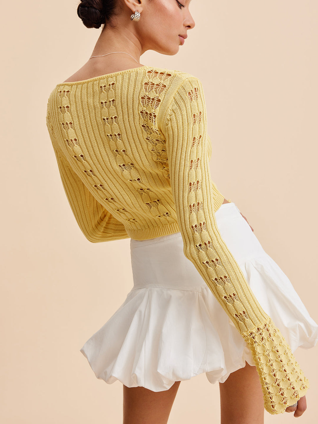 Cardigan en maille crochet à manches cloche