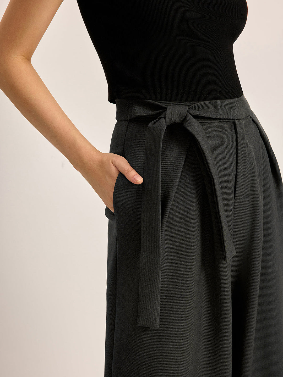 Pantalons à taille mi-haute avec ceinture et poches