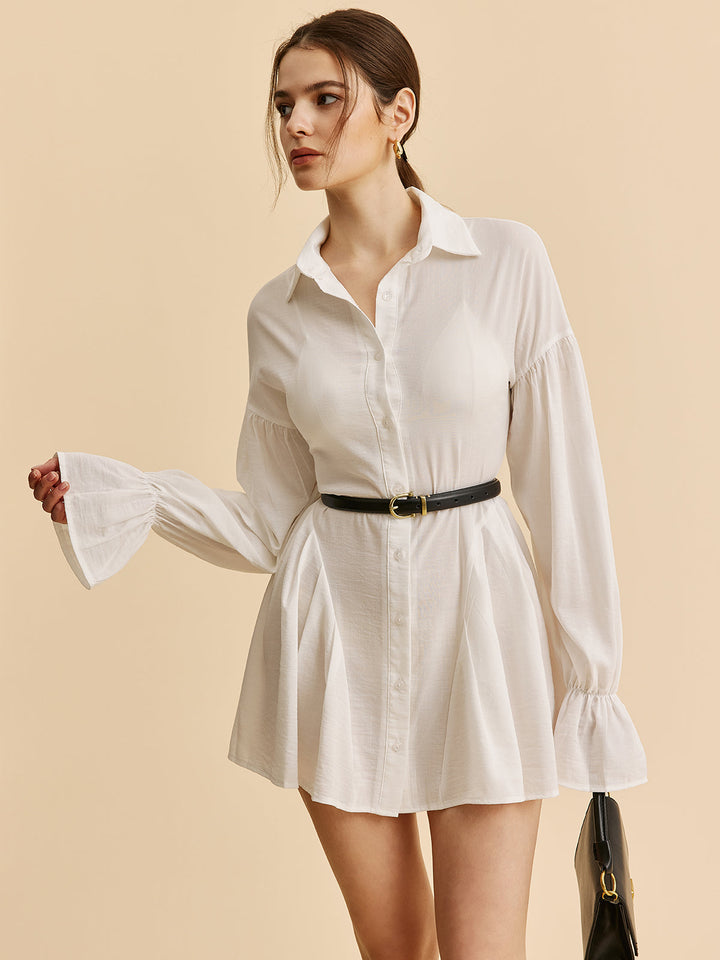 Robe chemise boutonnée à manches ballon semi-transparente