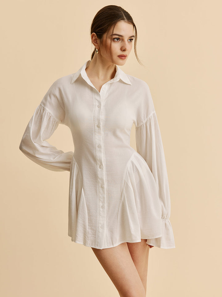 Robe chemise boutonnée à manches ballon semi-transparente