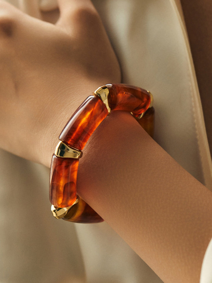 Bracelet jonc à maillons en résine