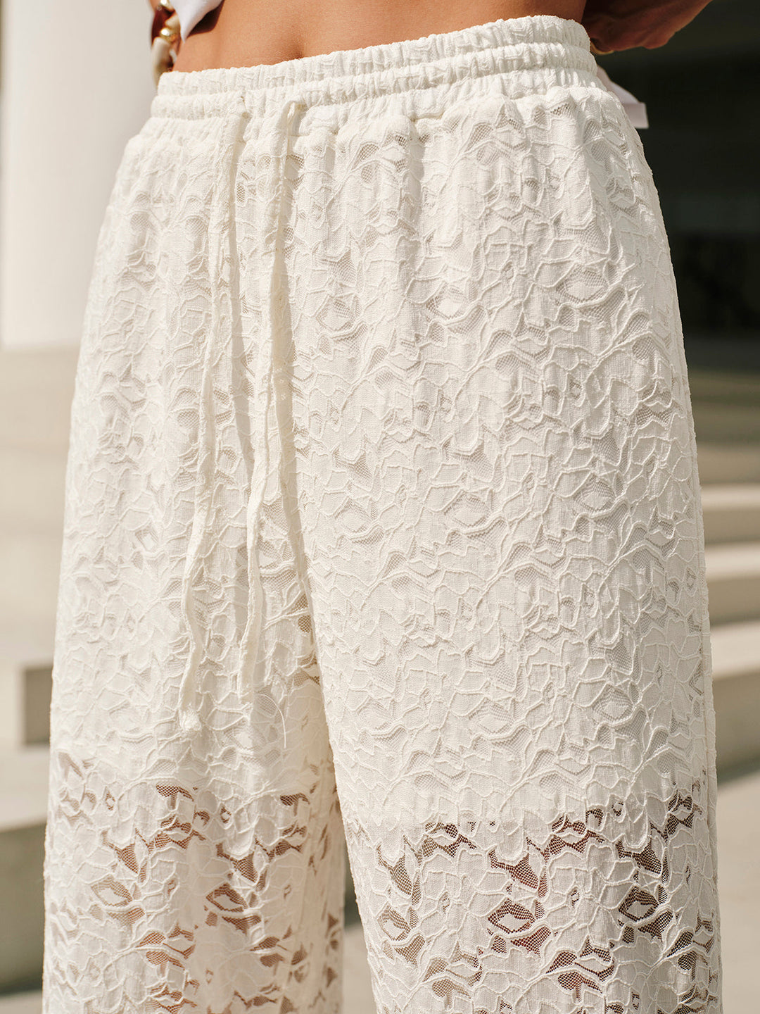 Pantalon à cordon de taille mi-haute en dentelle