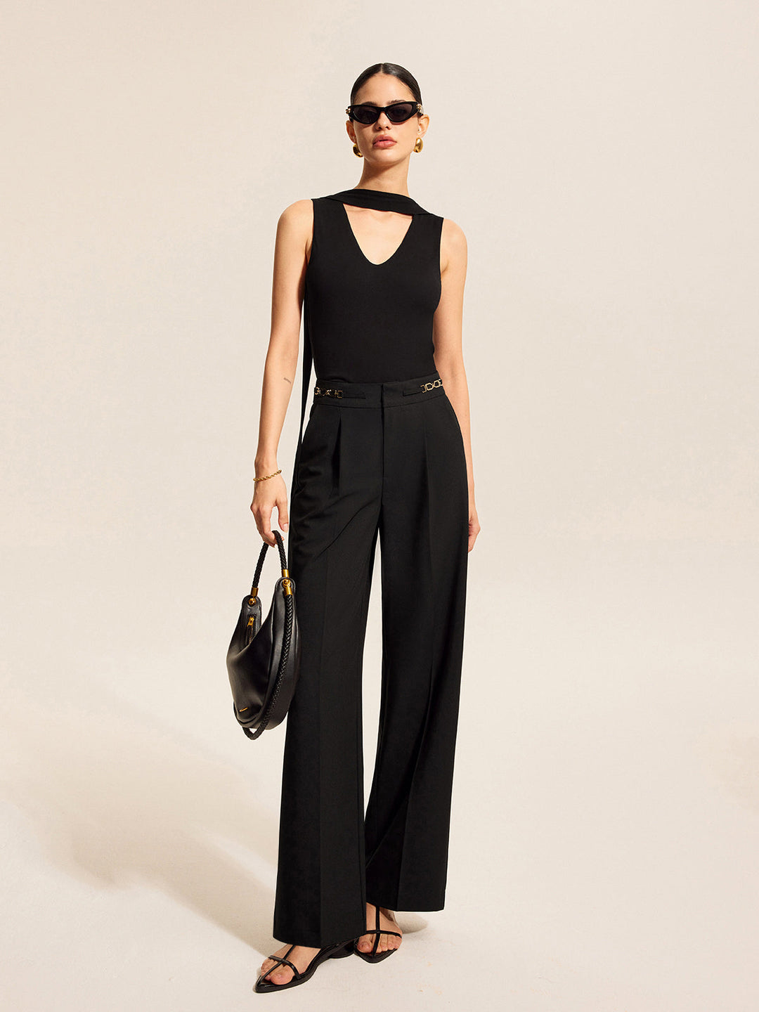 Pantalons plissés mi-taille avec détail chaîne