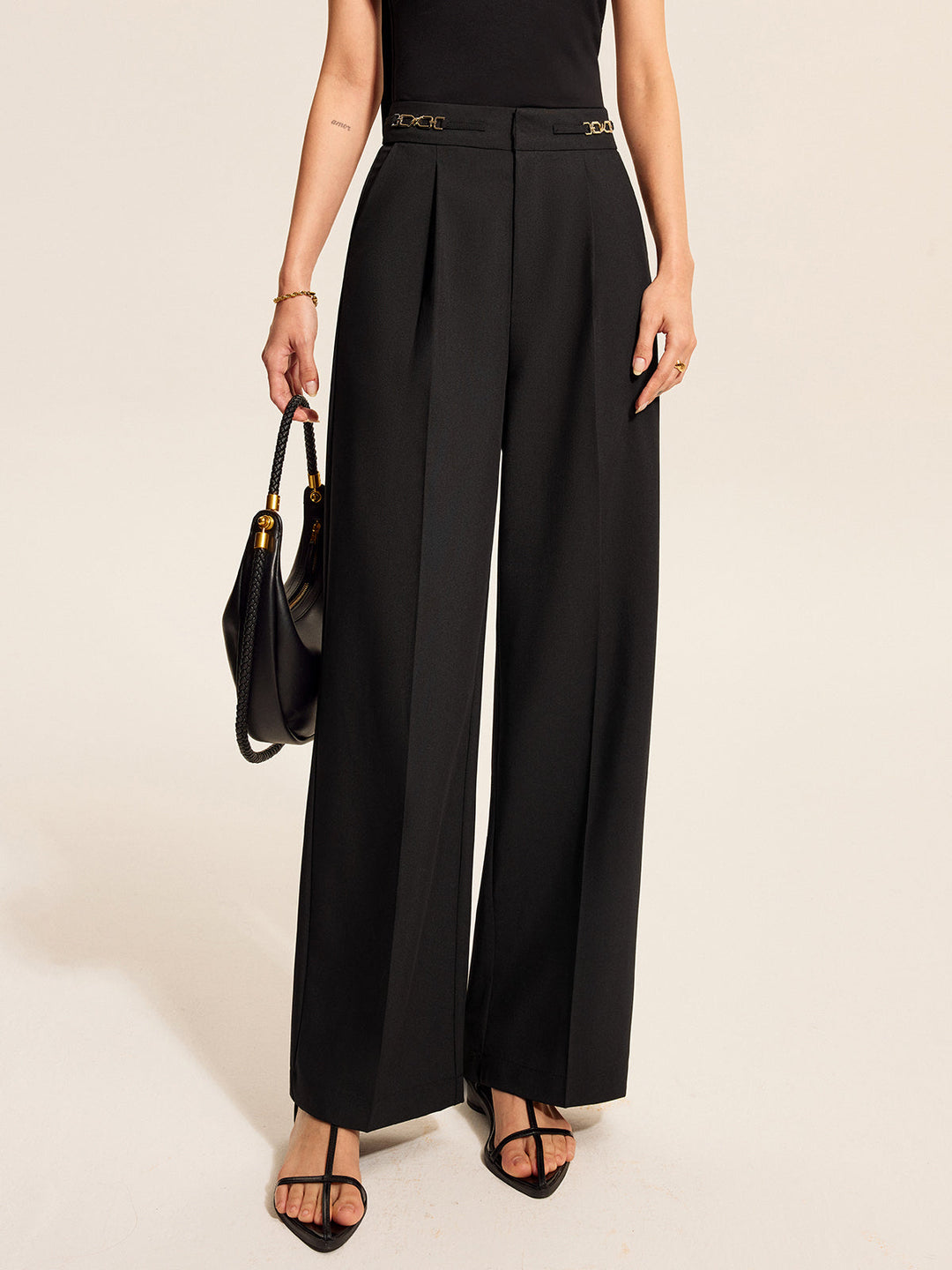 Pantalons plissés mi-taille avec détail chaîne