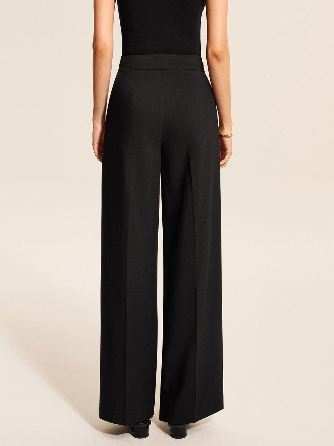 Pantalons plissés mi-taille avec détail chaîne