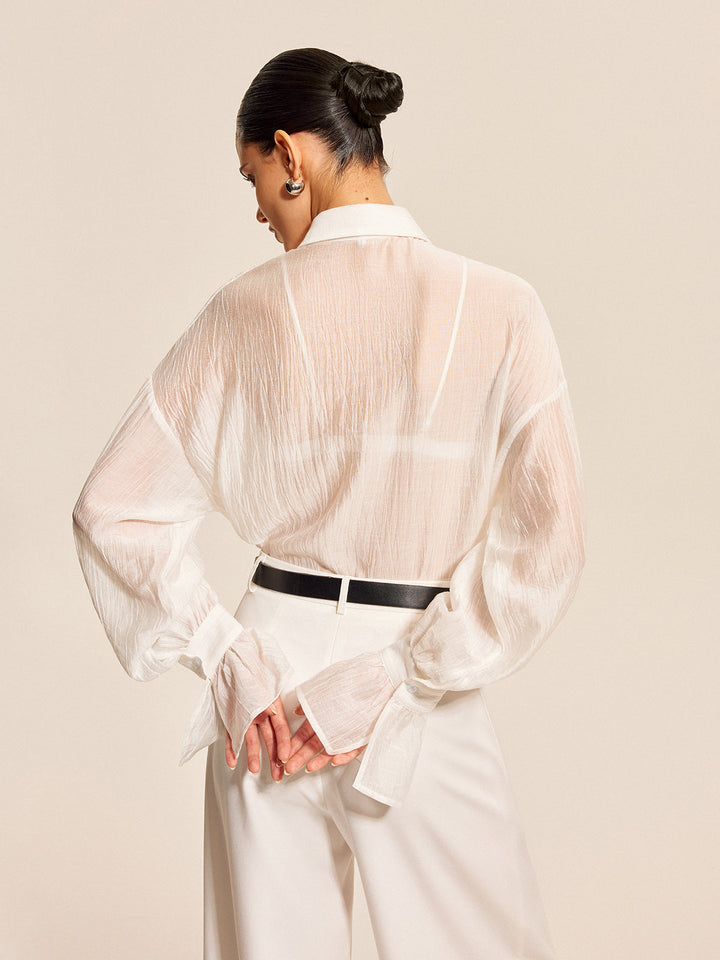 Blouse à nœud transparent