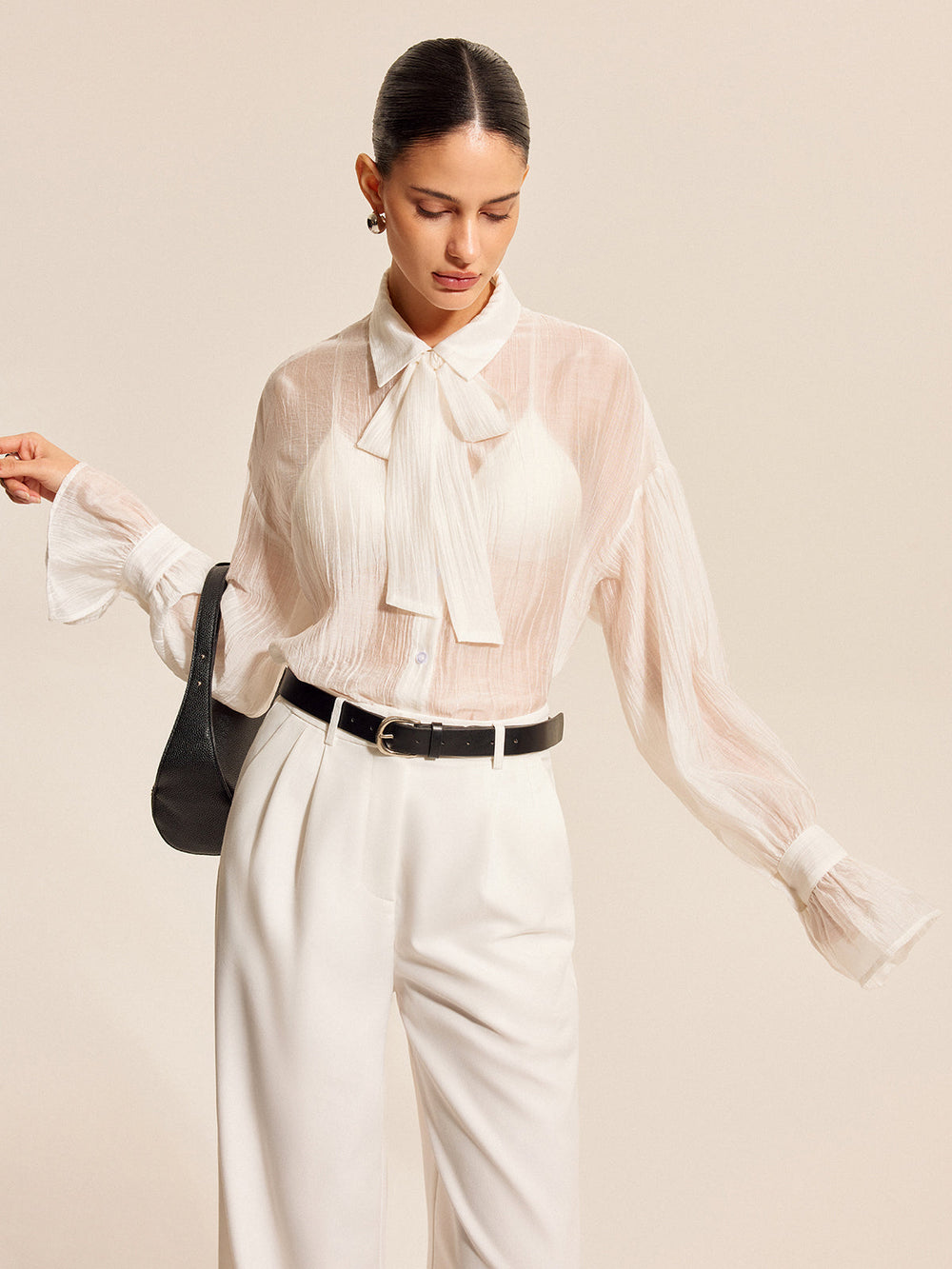 Blouse à nœud transparent