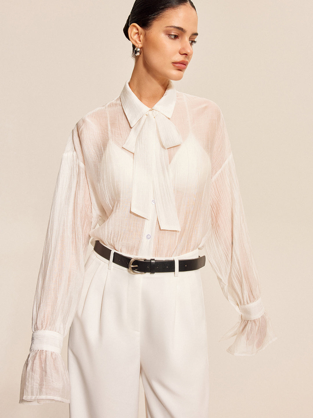 Blouse à nœud transparent