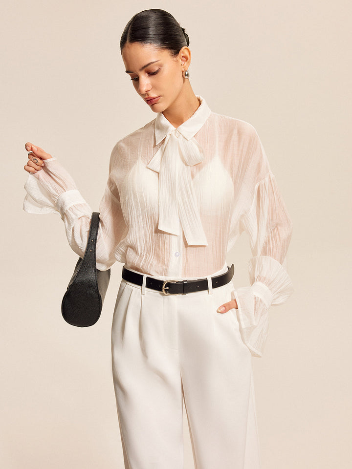 Blouse à nœud transparent