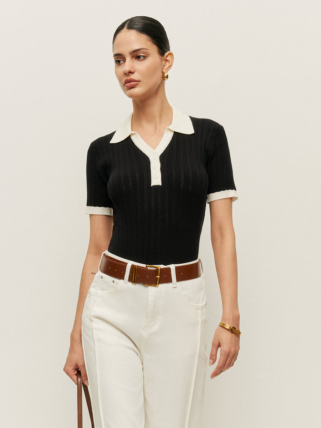 Haut en tricot côtelé avec col et détails boutonnés