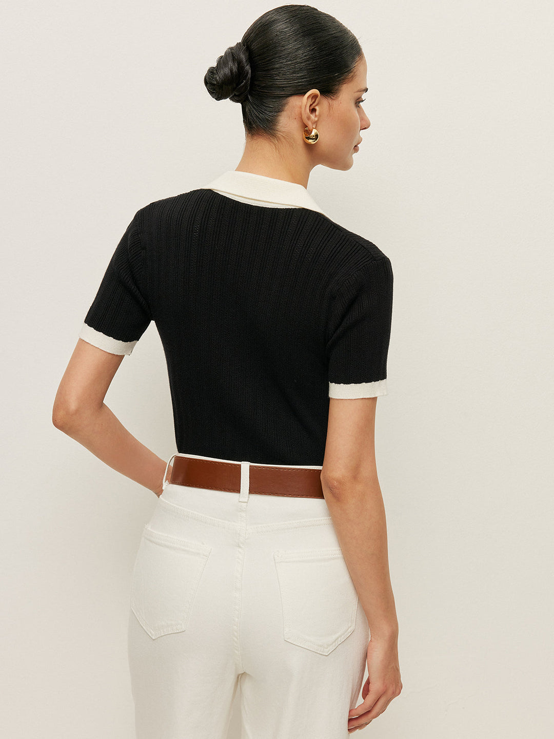 Haut en tricot côtelé avec col et détails boutonnés