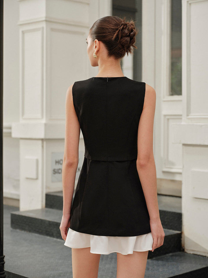 Robe sans manches à volants et boutons