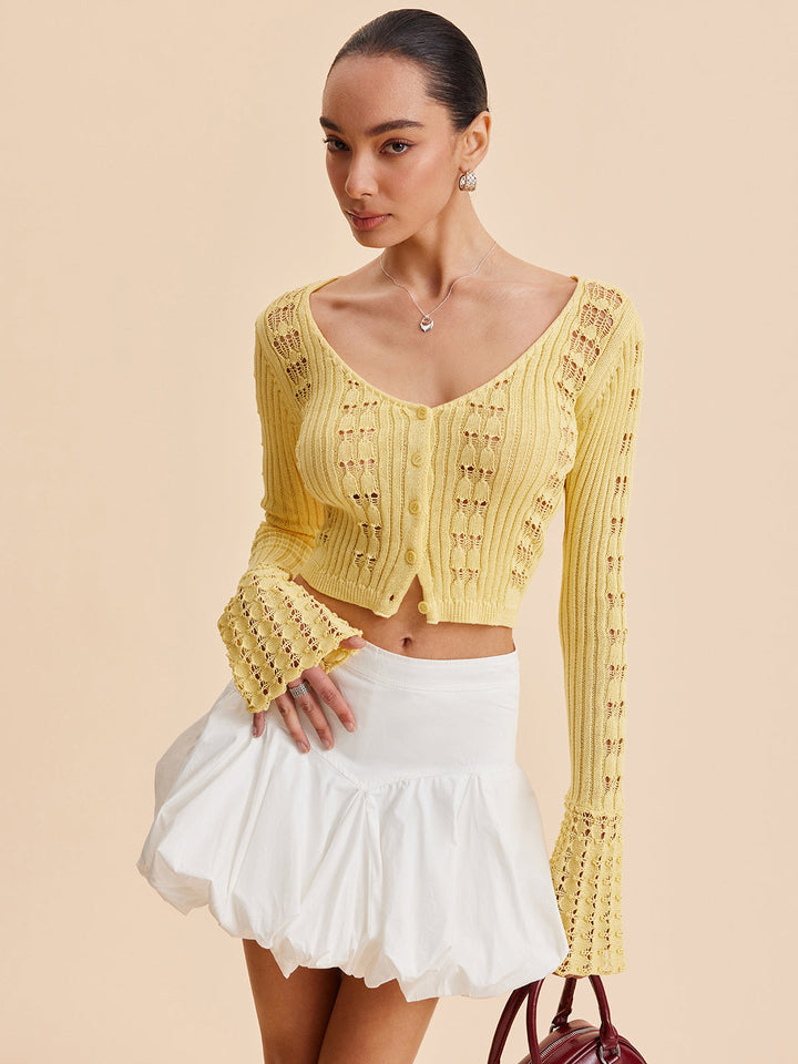 Cardigan en maille crochet à manches cloche