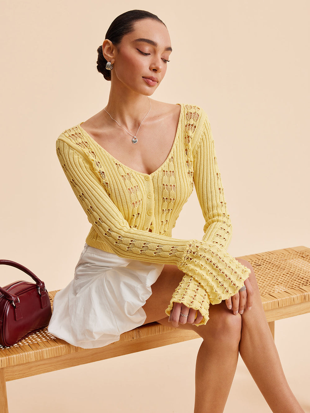 Cardigan en maille crochet à manches cloche