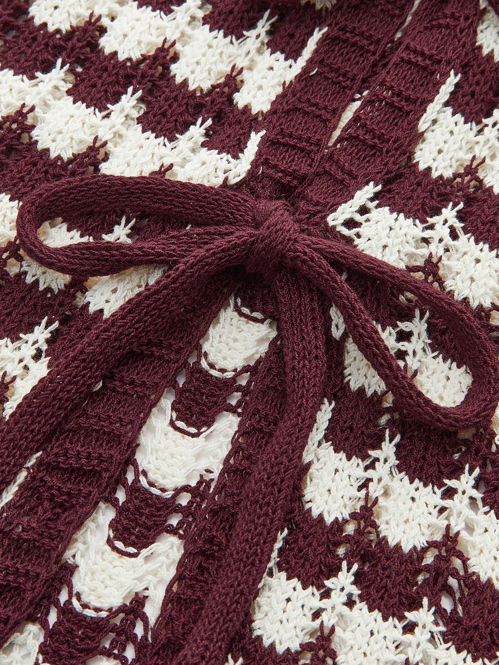 Haut en tricot avec nœud papillon contrastant