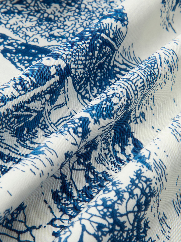 Robe imprimée à épaules dénudées et smockées