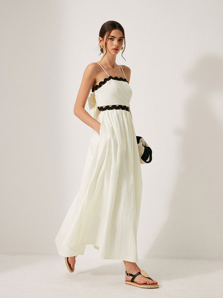 Robe à dos noué avec bordure festonnée