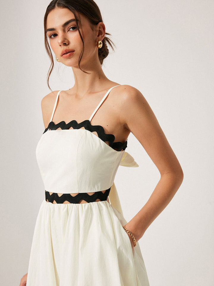 Robe à dos noué avec bordure festonnée