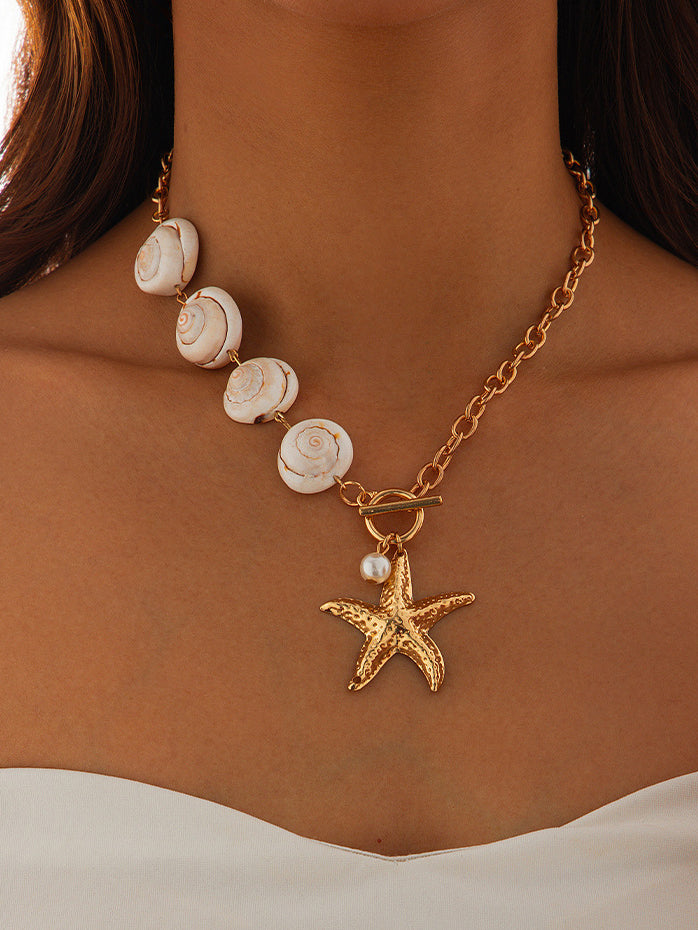 Collier pendentif coquillage et étoile de mer