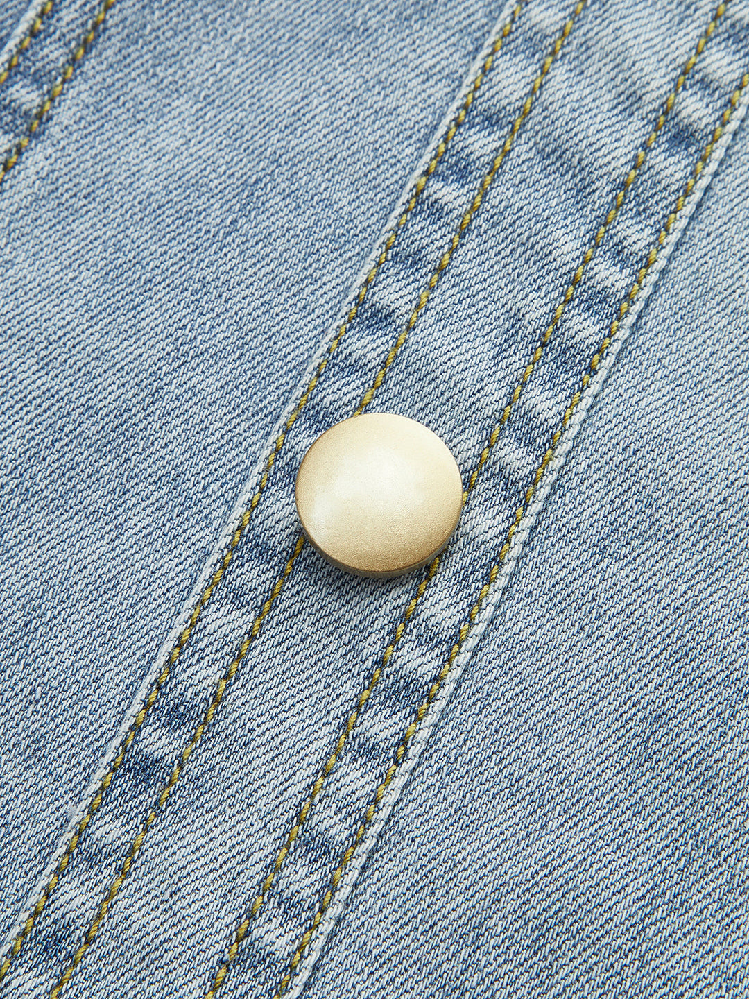 Robe sans manches en jean à boutonnage sur le devant