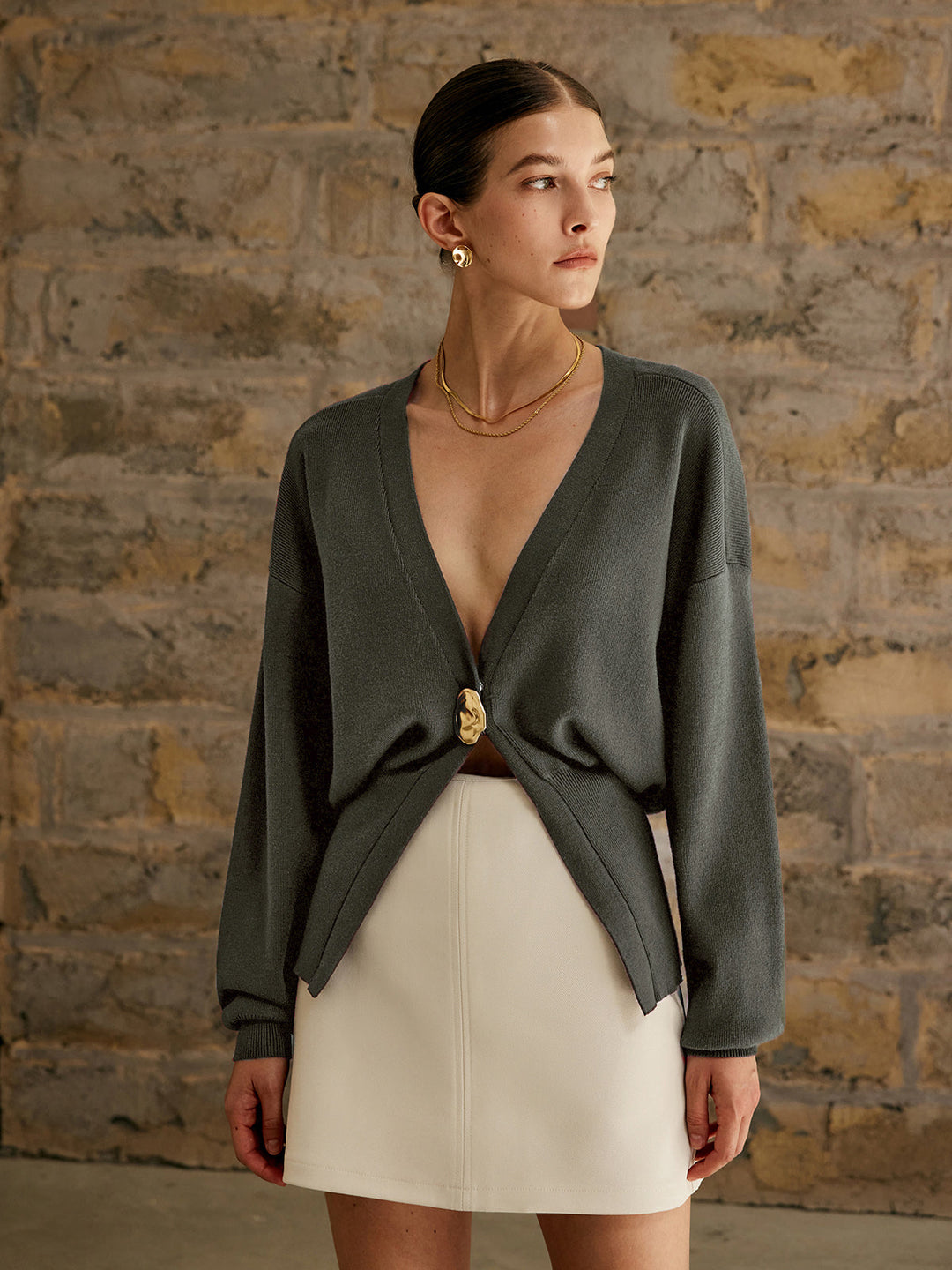 Cardigan uni à boutons dorés