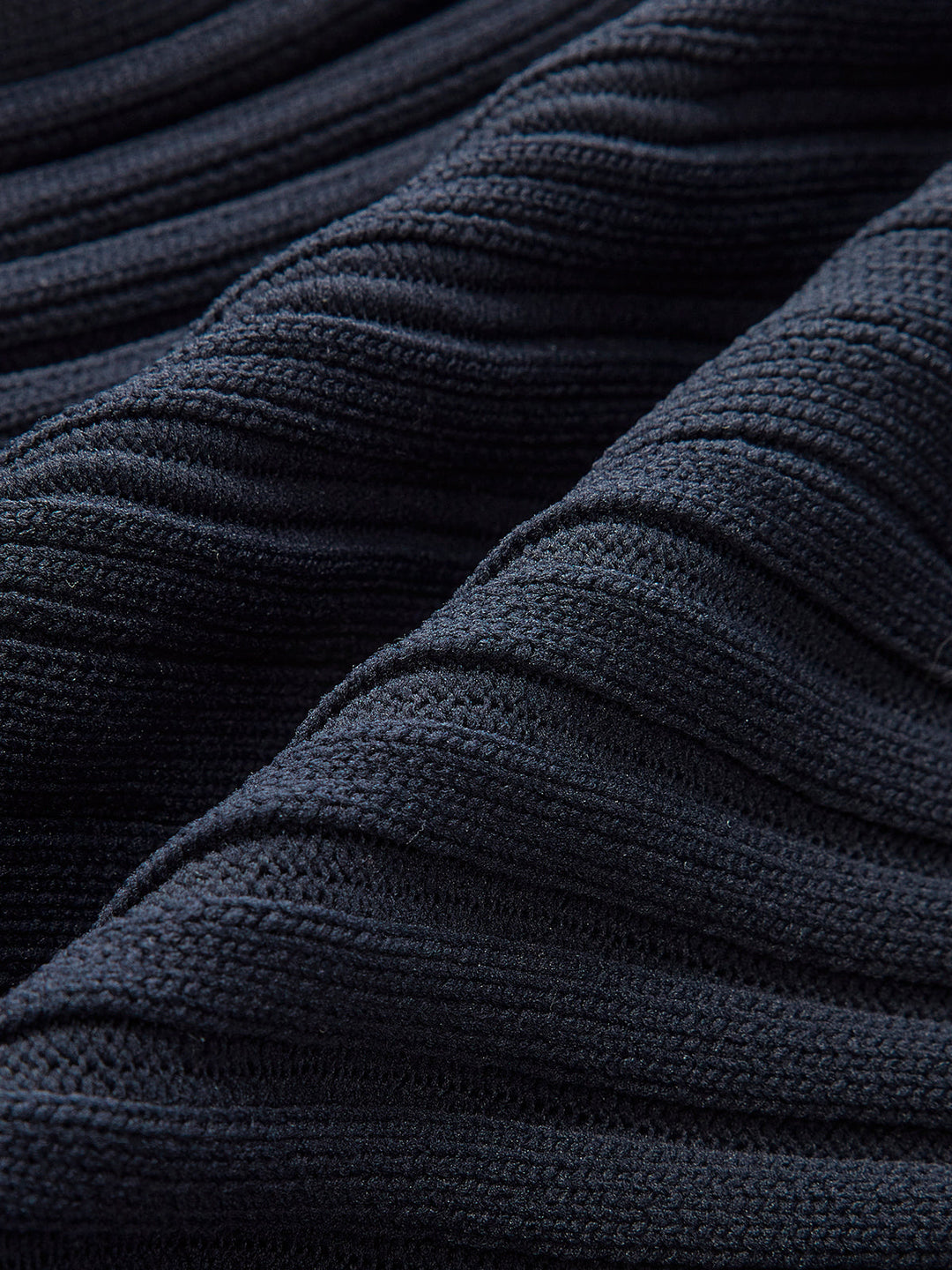 Gilet en tricot à boutons et basque