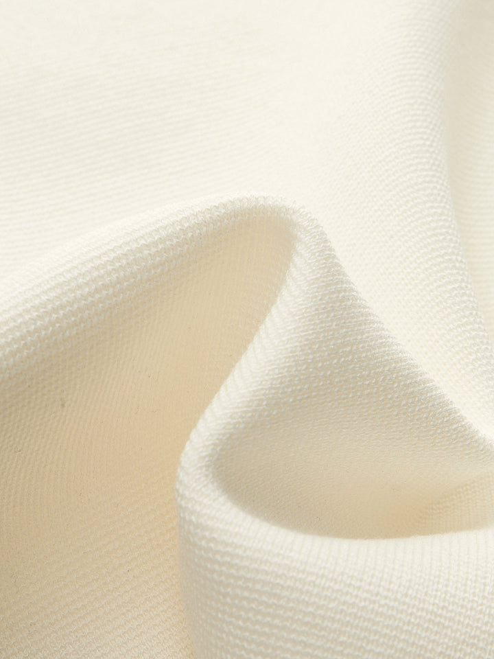 Gilet sans manches en maille à col en V avec détails métalliques
