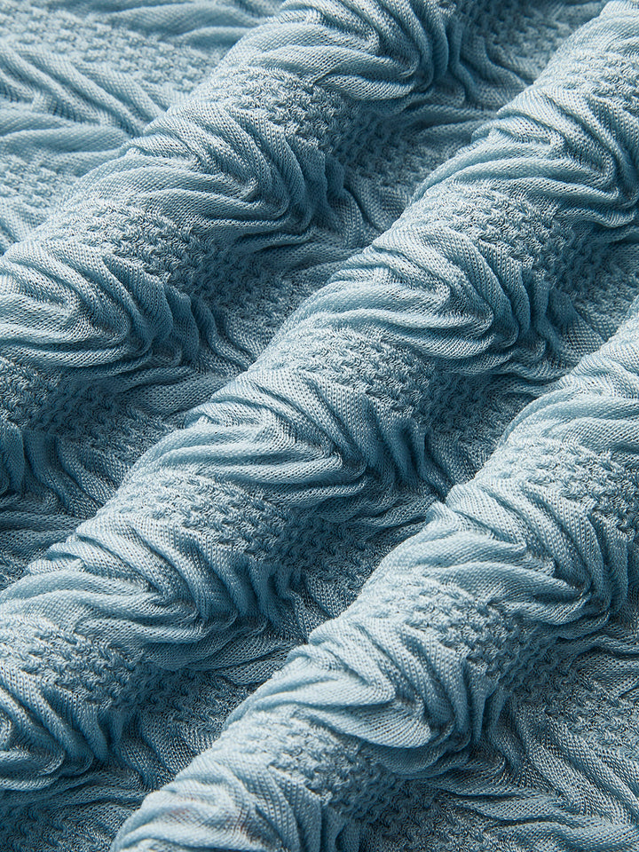 Robe à épaules dénudées avec volants