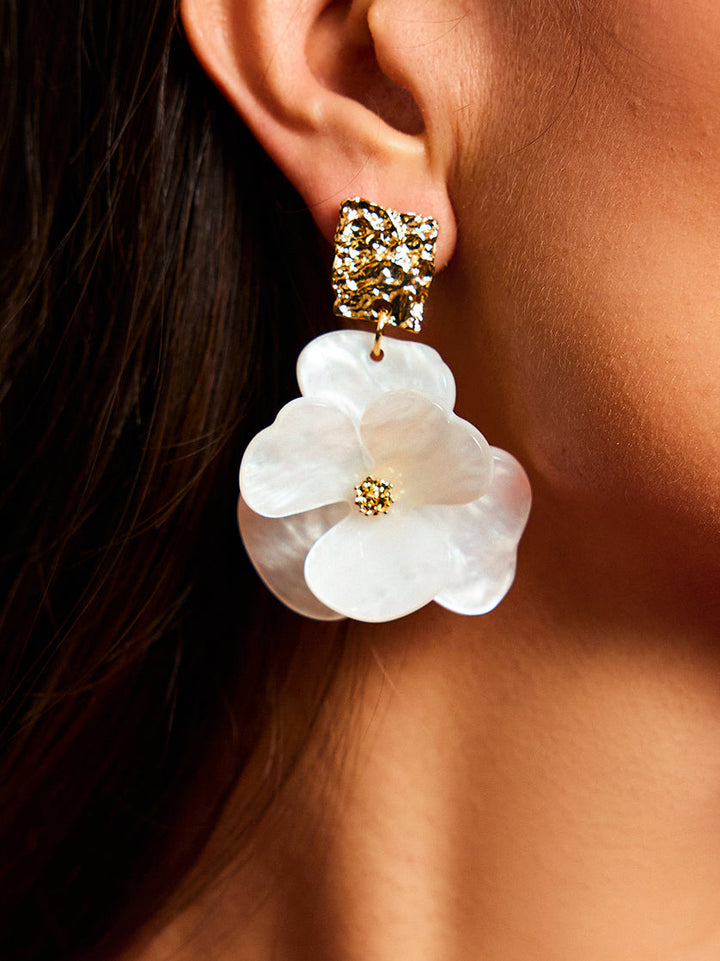 Boucles d'oreilles pendantes florales dorées