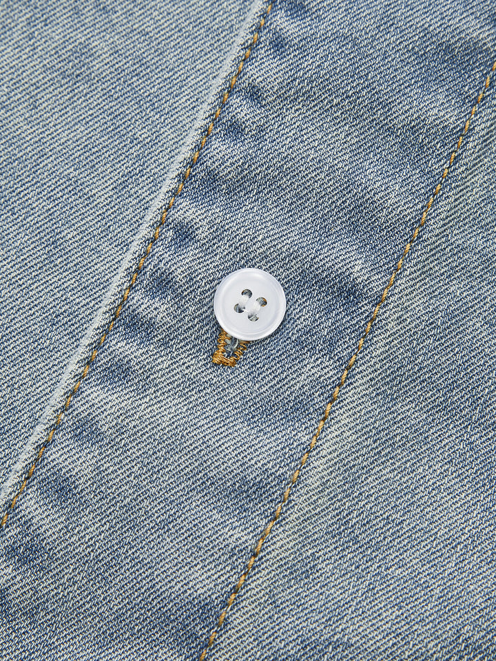 Chemise courte en jean à col asymétrique