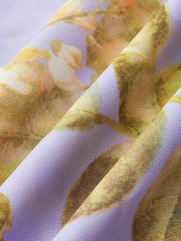 Couverture en maille avec ceinture nouée et imprimé floral