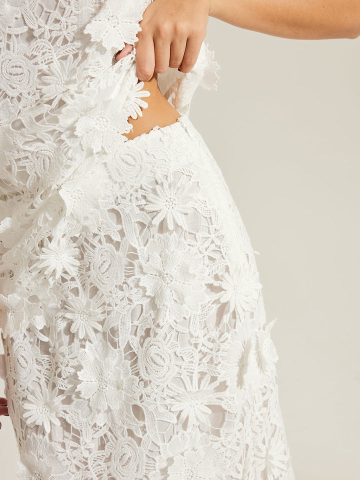 Jupe en dentelle semi-transparente avec broderie florale