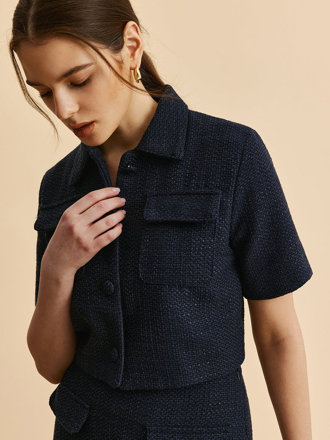Veste à poches à manches courtes