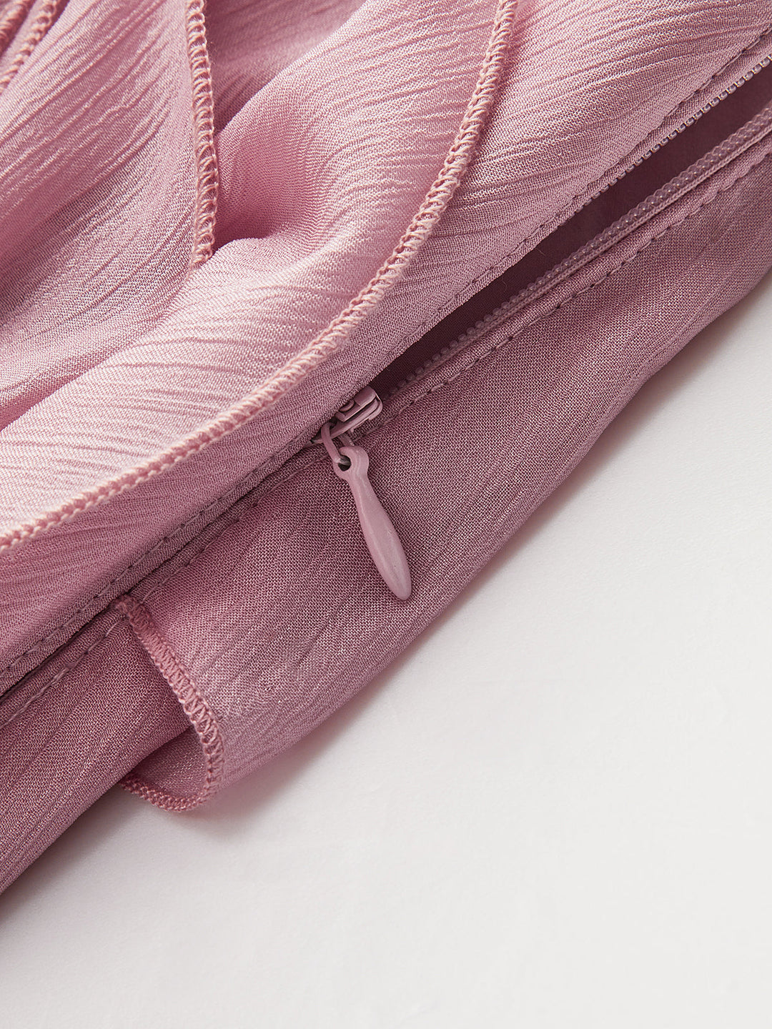 Jupe-short drapée en mousseline semi-transparente avec rosette 3D
